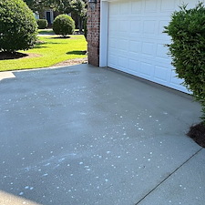 Quick-Driveway-Cleaning-to-Get-the-HOA-off-Clients-Back 1